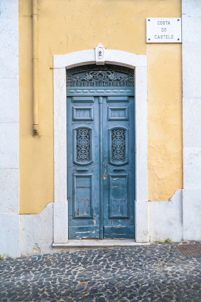 Charming Blue Door Entrance by Christa Stroo — canvas wall art