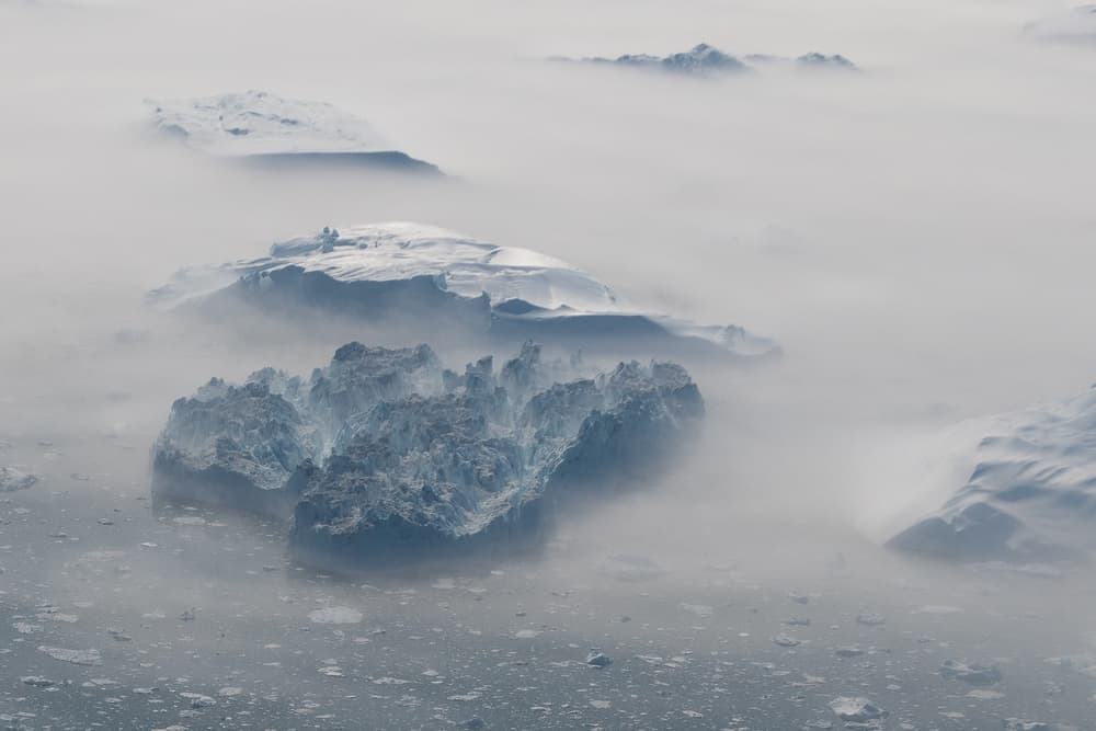 Icebergs in Mist by Marc Pelissier — canvas wall art