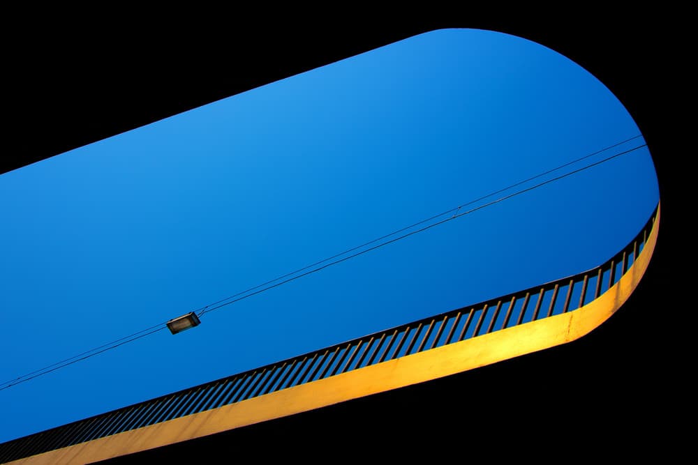 Golden Curve Blue Sky by Rolf Endermann — canvas wall art