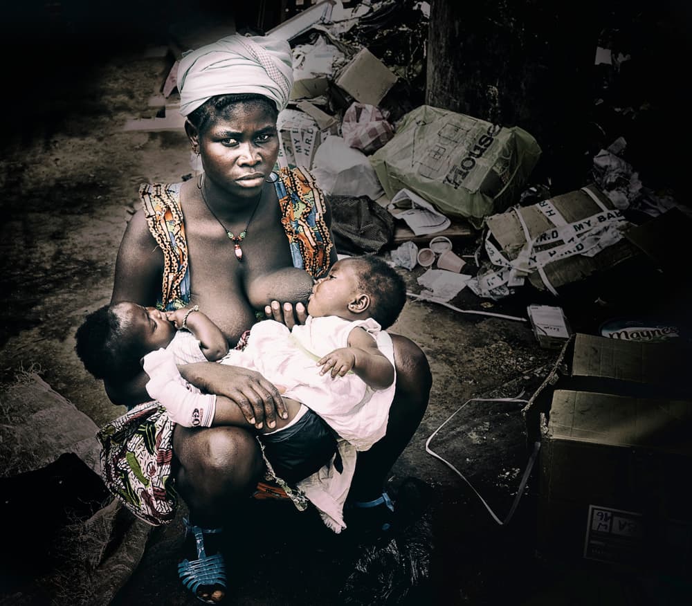 African Mother Nursing by Elena Molina — canvas wall art