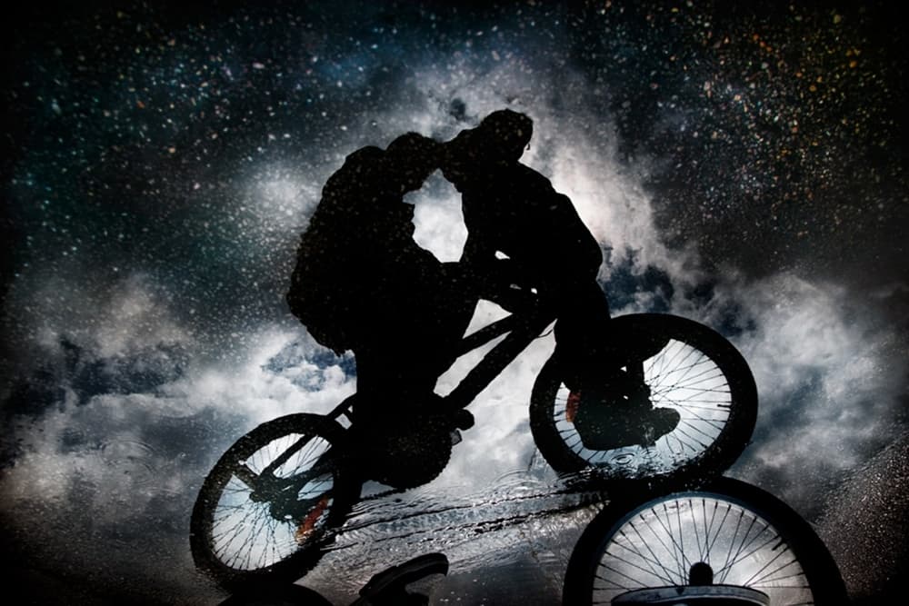 Starry Night BMX Ride by Antonio Grambone — canvas wall art