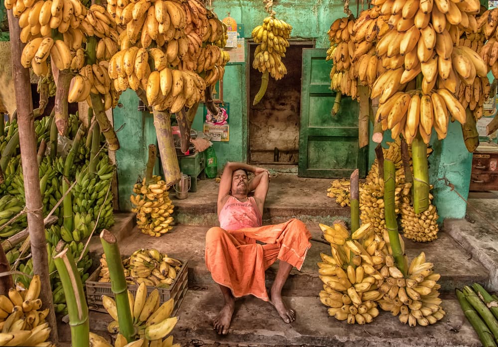 Man Resting Banana Market by Anette Ohlendorf — canvas wall art