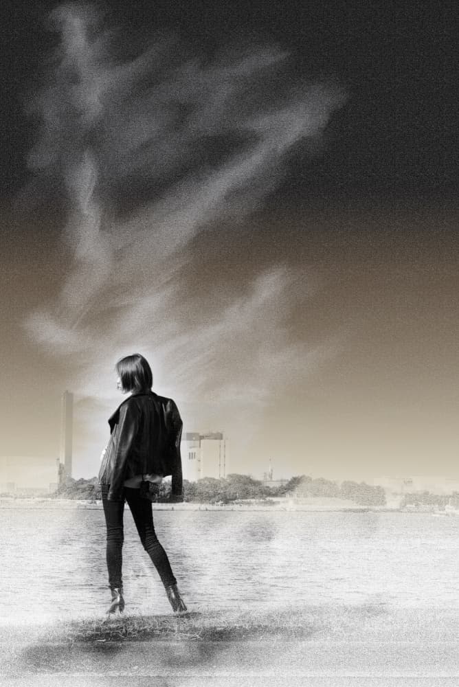 Woman Under Dramatic Sky by moucorn — canvas wall art
