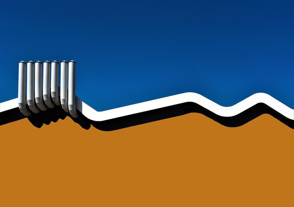 White Pipes Blue Sky by Arnon Orbach — canvas wall art