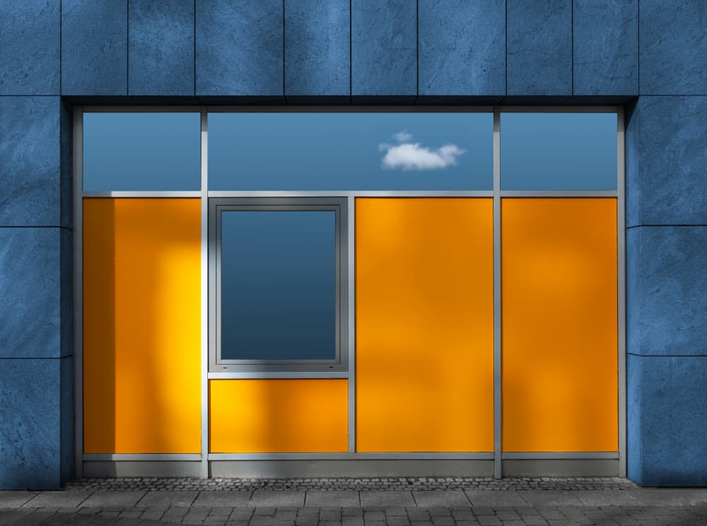 Vibrant Blue Orange Facade by Roland M Schwerdtfeger — canvas wall art