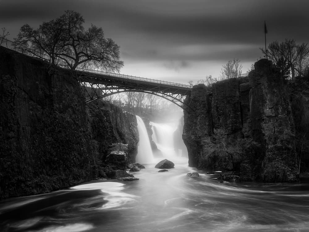 Dramatic Falls Bridge by Yimei Sun — canvas wall art