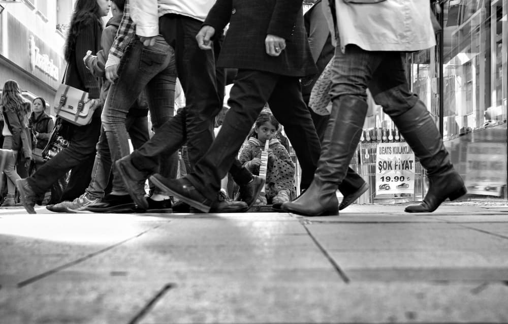 Urban Crowd Lone Child by Ali Ayer — canvas wall art