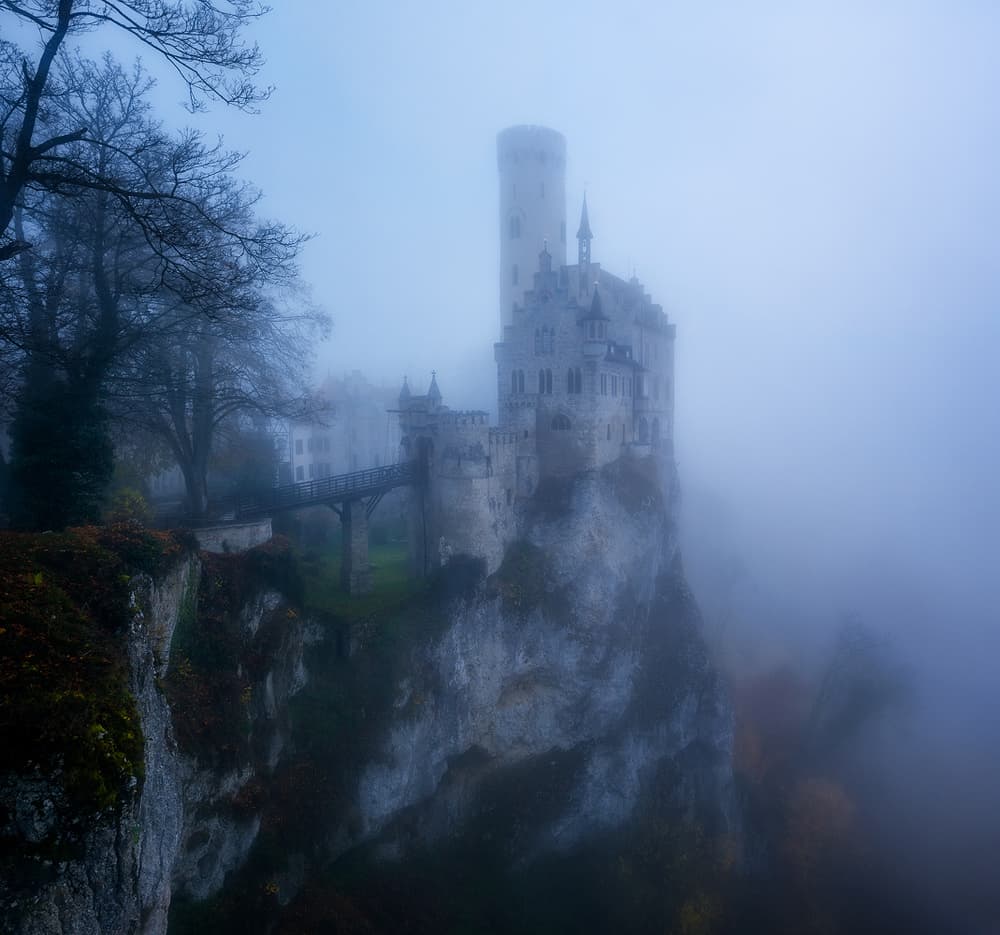 Misty Cliffside Castle by Daniel Gastager — canvas wall art