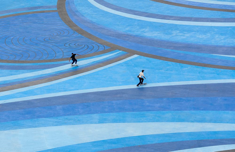 Skaters On Blue Waves by Karim Al Thahaby — canvas wall art