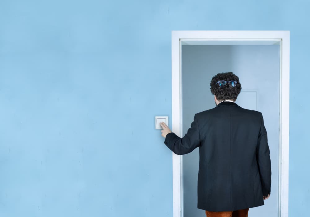 Man Pressing Light Switch by Michael Allmaier — canvas wall art