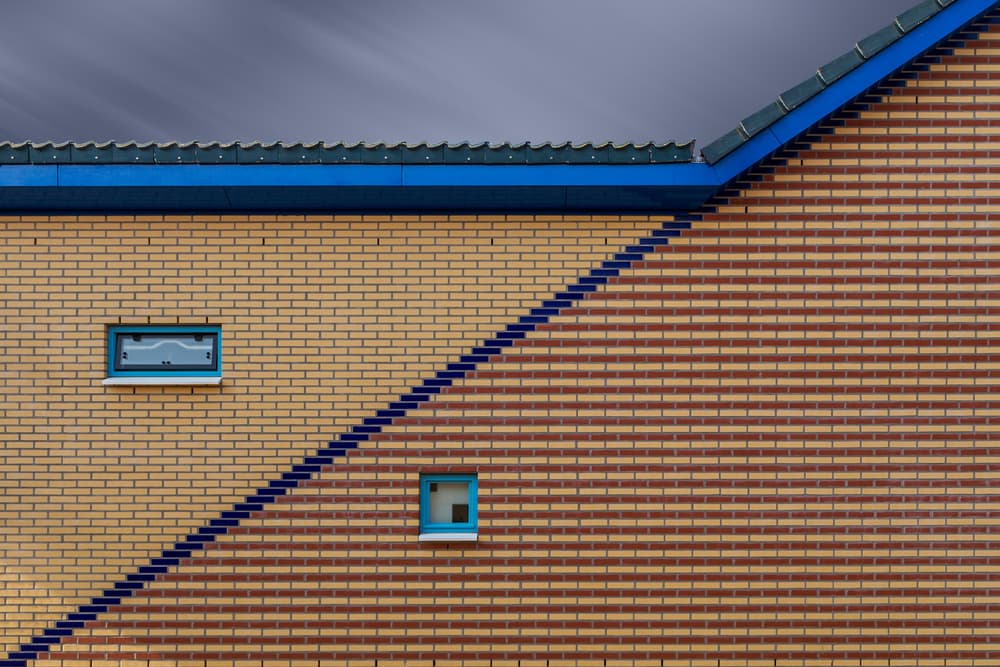 Geometric Brick Facade by Theo Luycx — canvas wall art