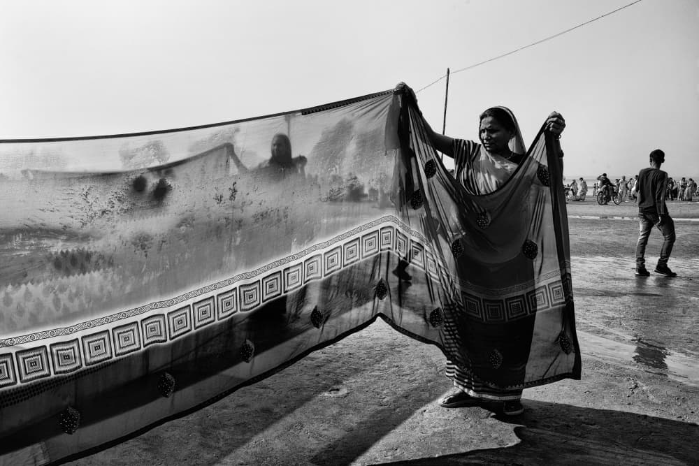 Indian Woman Drying Sari by Shaibal Nandi — canvas wall art