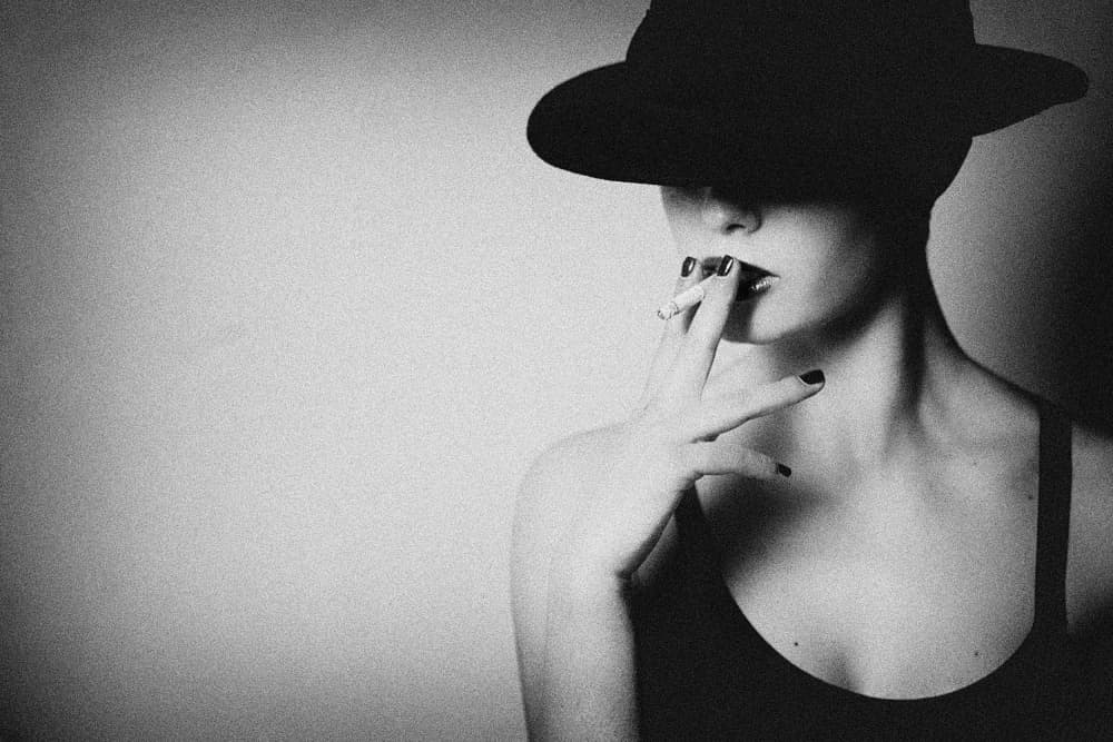Mysterious Woman Smoking by Antonella Renzulli — canvas wall art