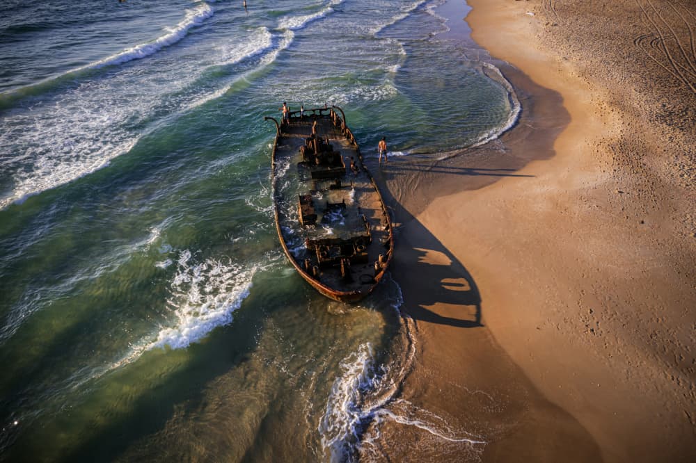 Abandoned Shipwreck Beach by Isam Telhami — canvas wall art