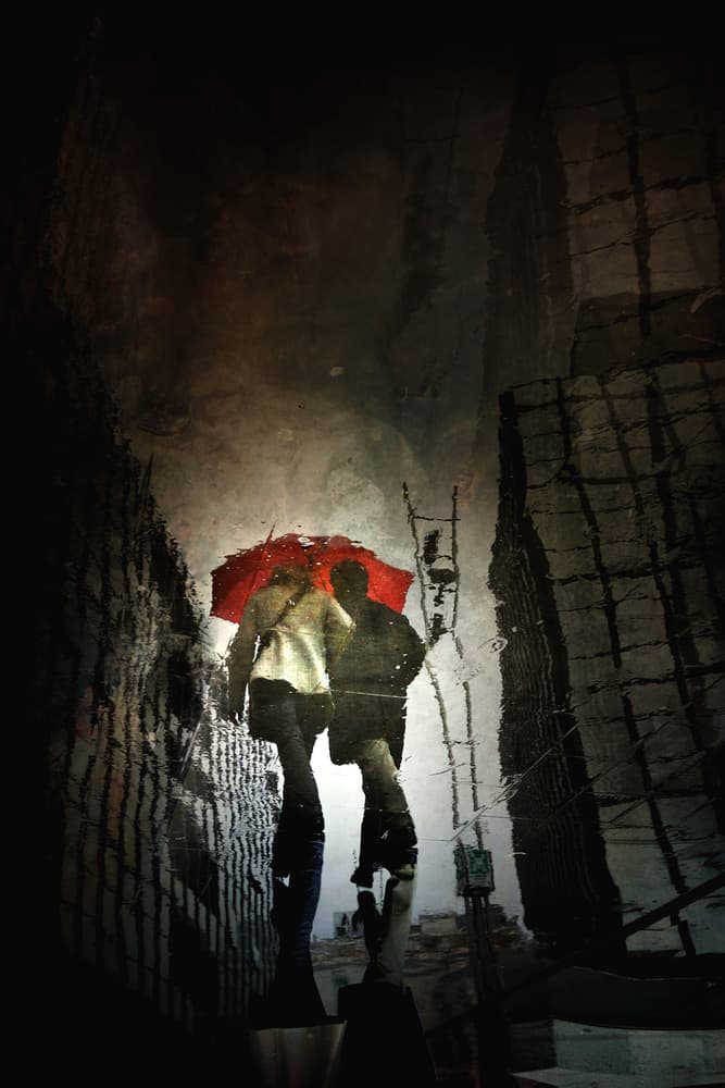 Red Umbrella Reflection by Antonio Grambone — canvas wall art