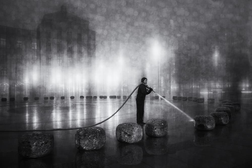 Man Sprays Urban Night by Roswitha Schleicher-Schwarz — canvas wall art