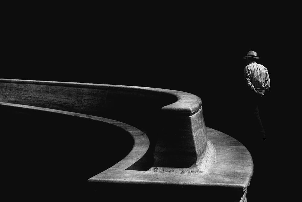 Man at Curved Bench by Antonio Grambone — canvas wall art