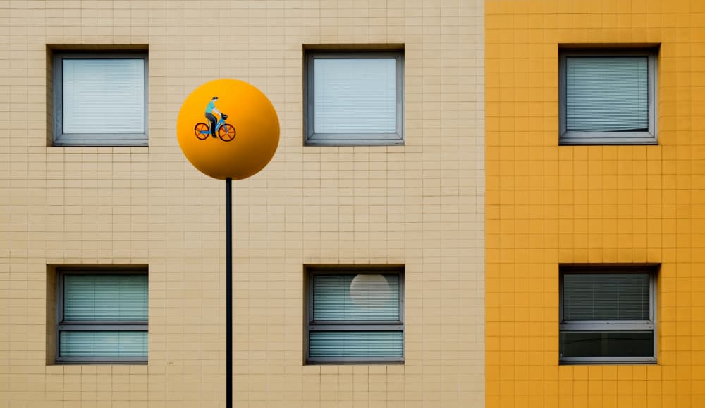 Yellow Facade Bicycle by Roberto Parola — canvas wall art