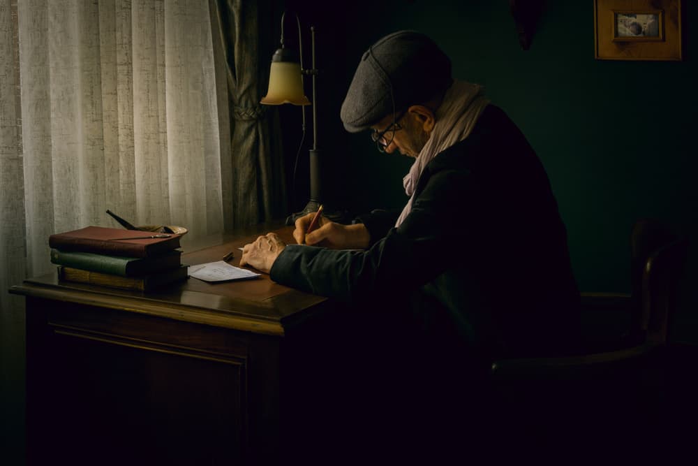 Man Writing At Desk by Ramiz Sahin — canvas wall art