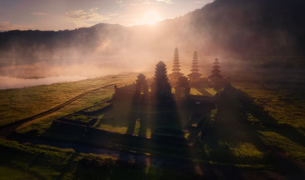 Misty Bali Temple Sunrise by Javier de la Torre — canvas wall art