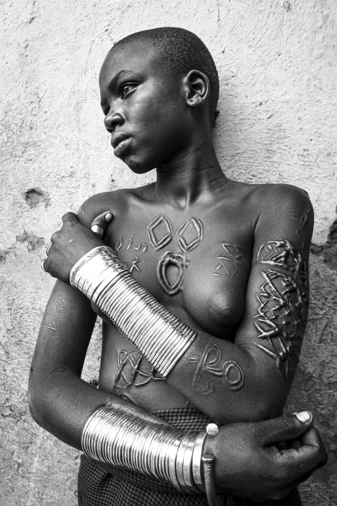 African Adornment Portrait by Elena Molina — canvas wall art