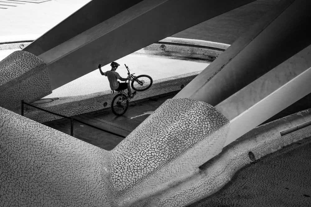 Dynamic Urban Bike Trick by Linda Wride — canvas wall art