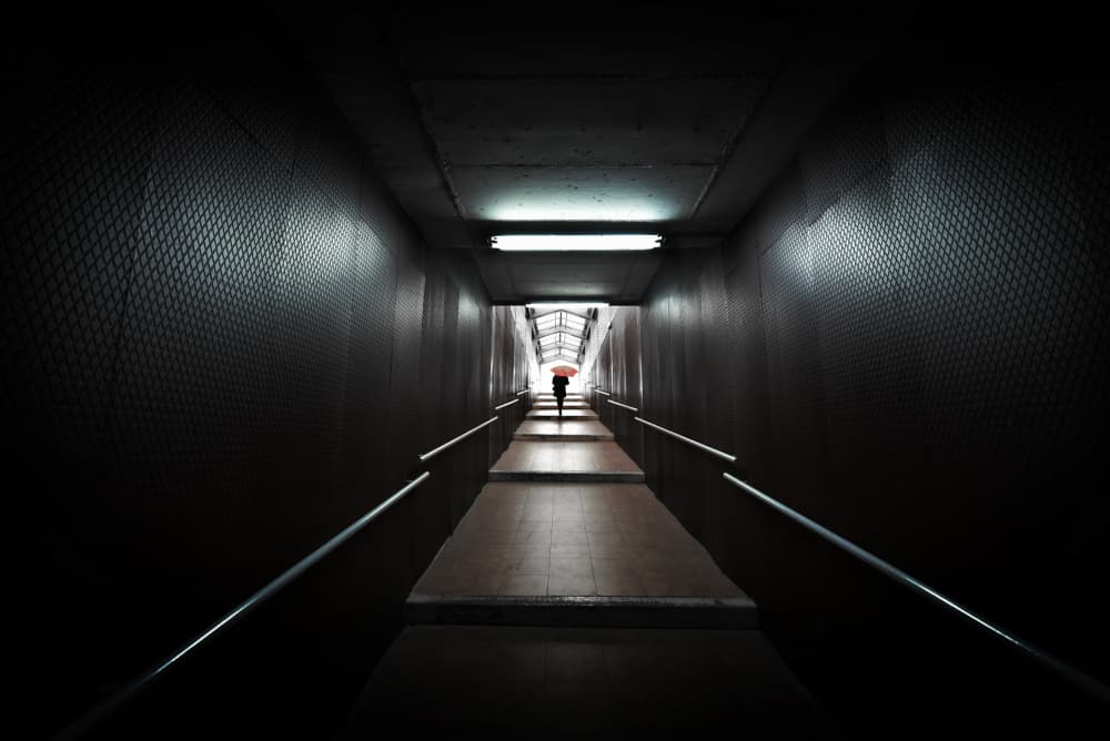 Red Umbrella Tunnel Exit by Jorge Pimenta — canvas wall art