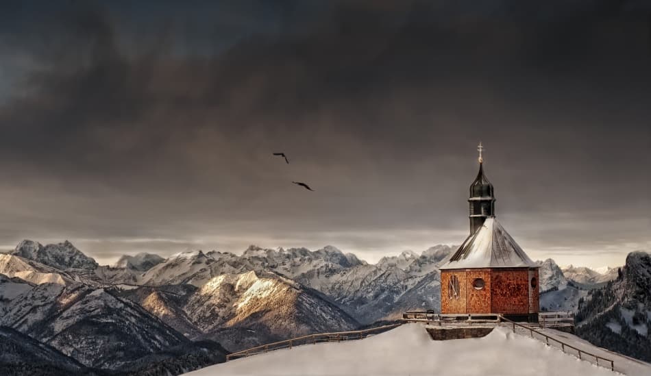 Snowy Mountain Chapel by Christoph Hessel — canvas wall art