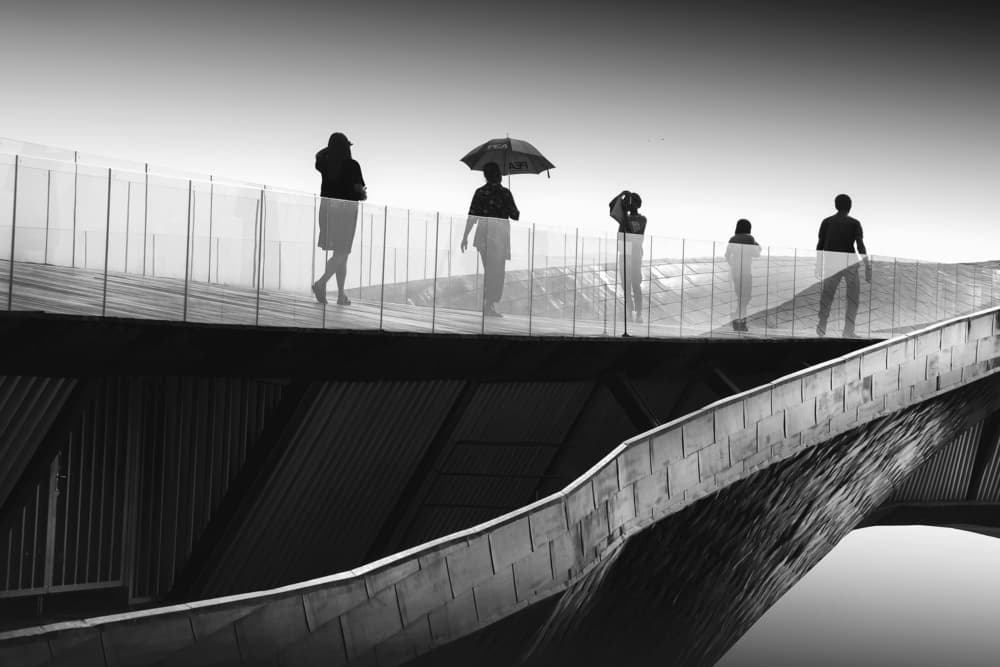 Silhouettes on Modern Bridge by Ekkachai Khemkum — canvas wall art