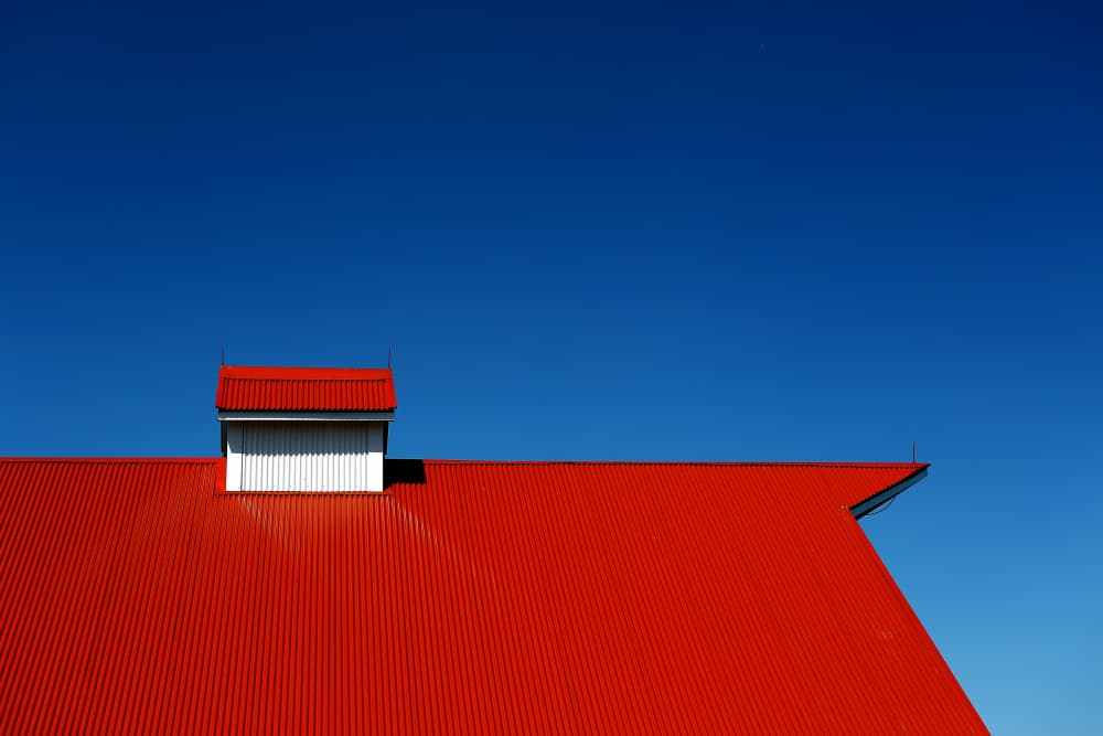 Modern Red Roof Blue Sky by Michael Burlak — canvas wall art