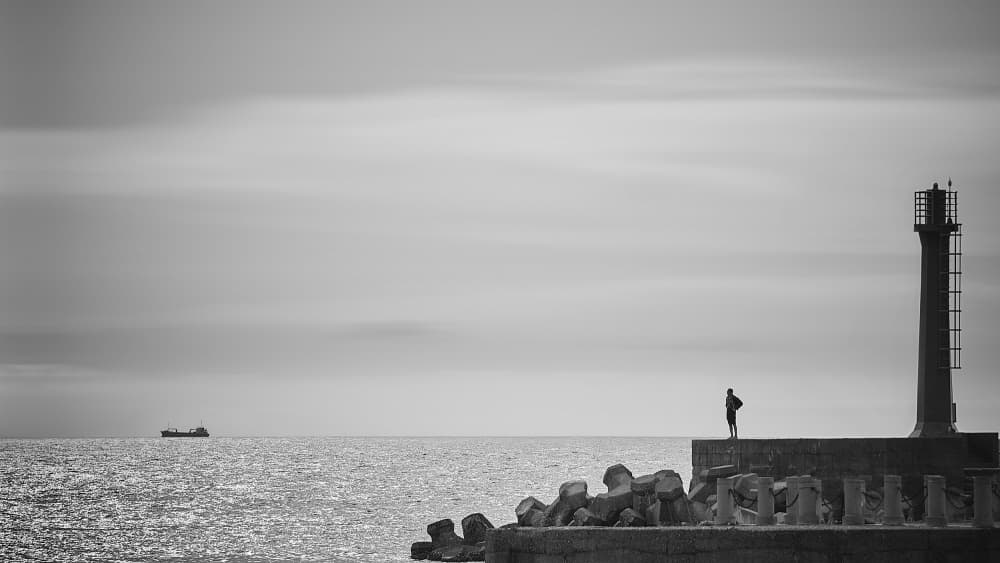 Man By The Lighthouse by MingLun Tsai (蔡明倫) — canvas wall art