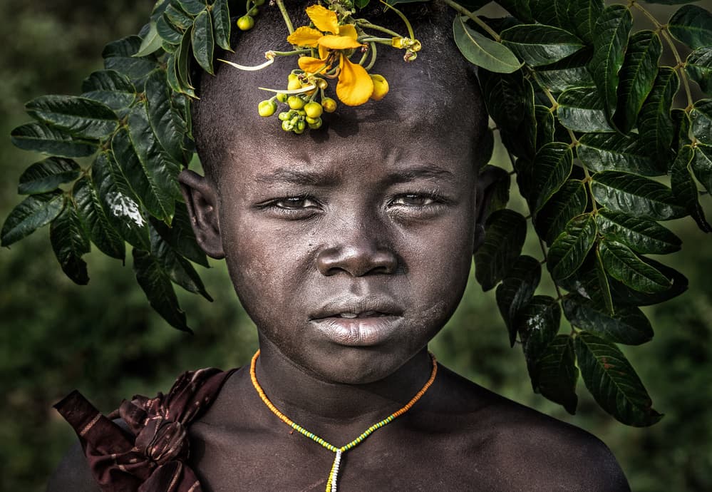 African Child Flower Crown by Joxe Inazio Kuesta Garmendia — canvas wall art