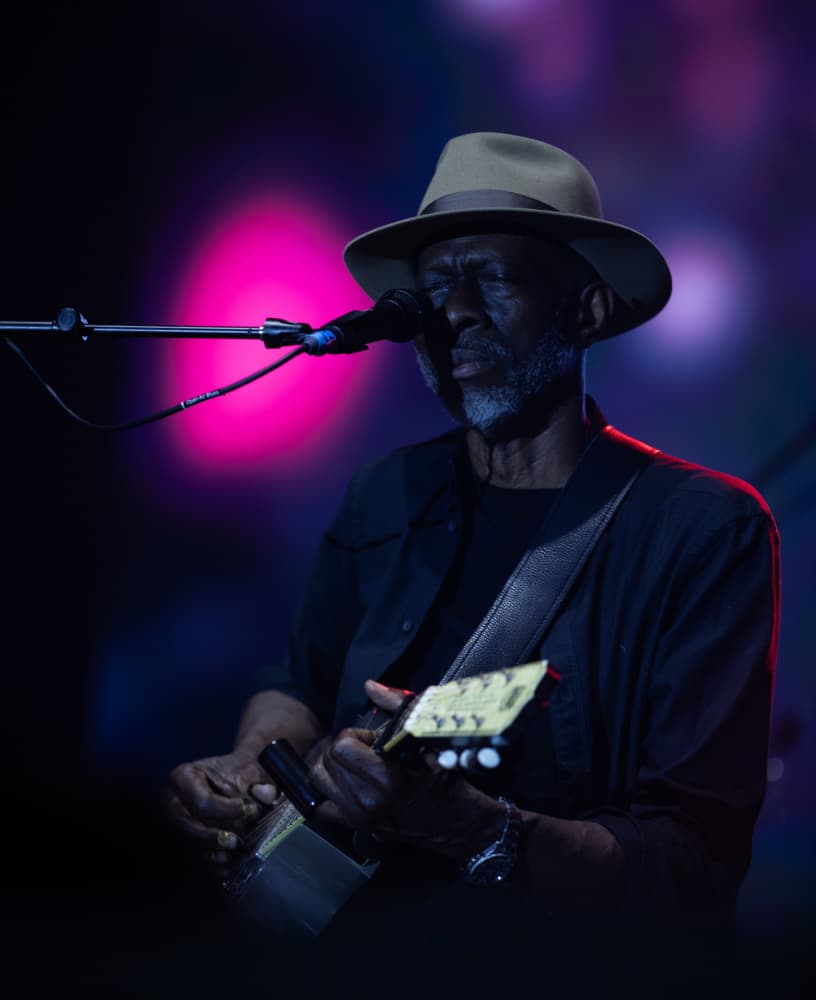Soulful Musician On Stage by Julien Oncete — canvas wall art