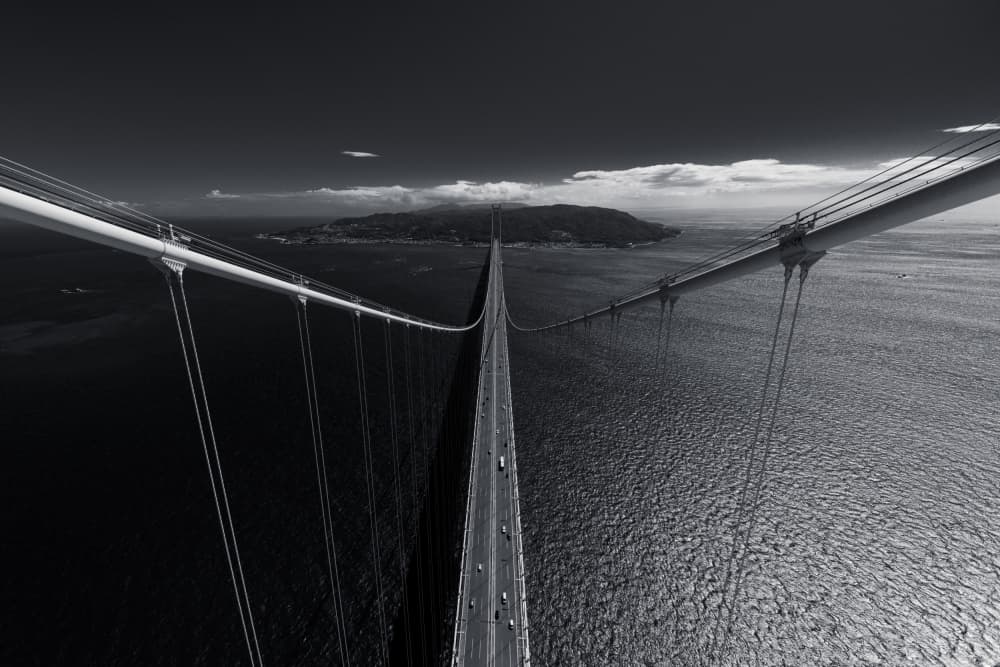 Dramatic Suspension Bridge by Tomoshi Hara — canvas wall art
