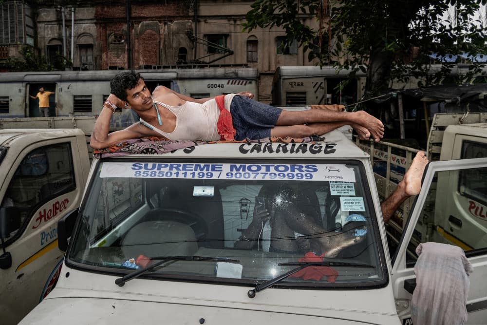 Urban Rooftop Rest by Kuntal Biswas — canvas wall art