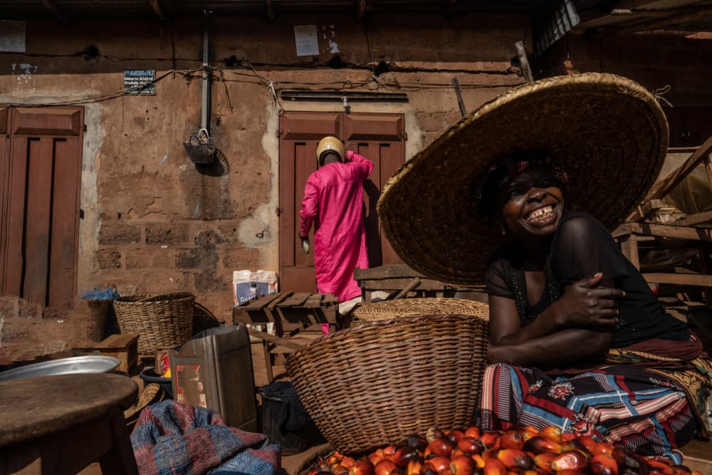Smiling Market Woman by Corinne Spector — canvas wall art