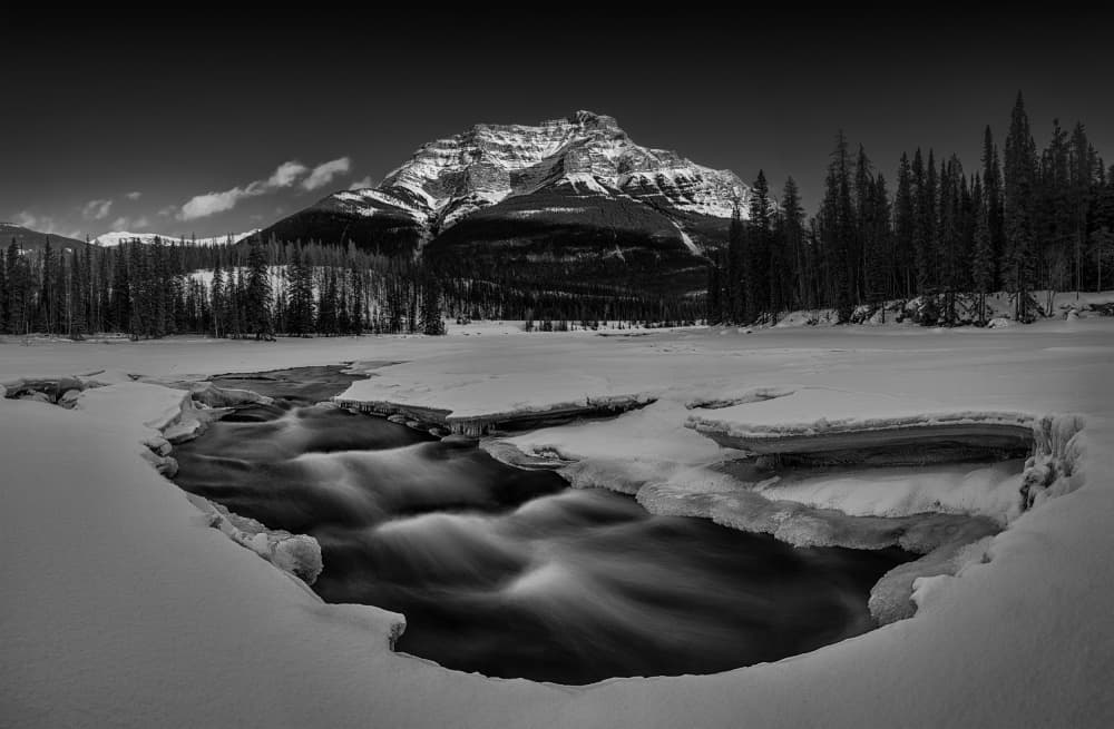 Snowy Mountain River by Lydia Jacobs — canvas wall art