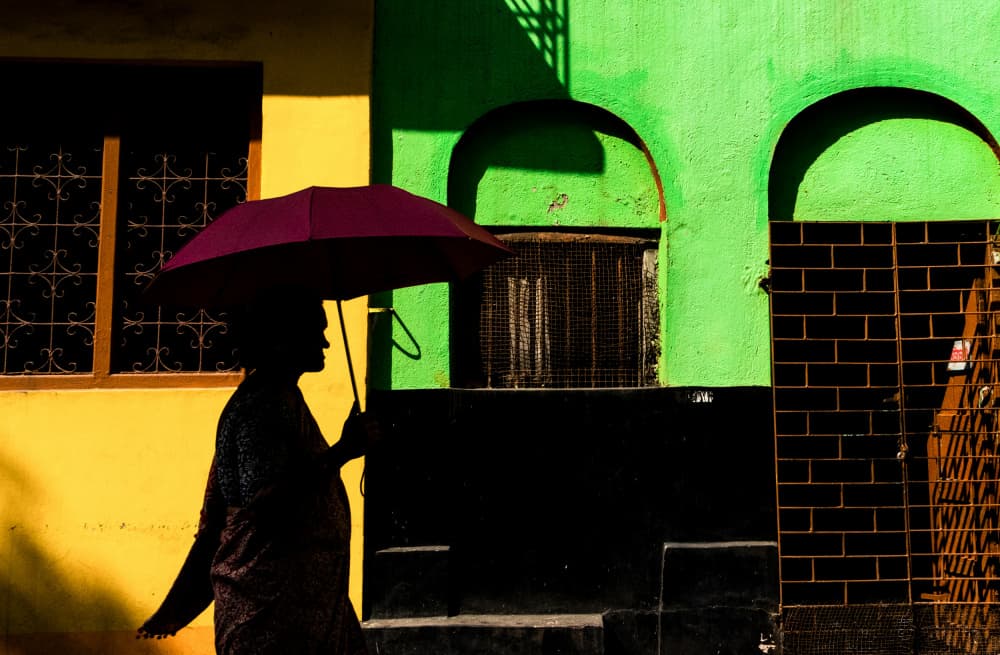 Vibrant Umbrella Silhouette by Kuntal Biswas — canvas wall art
