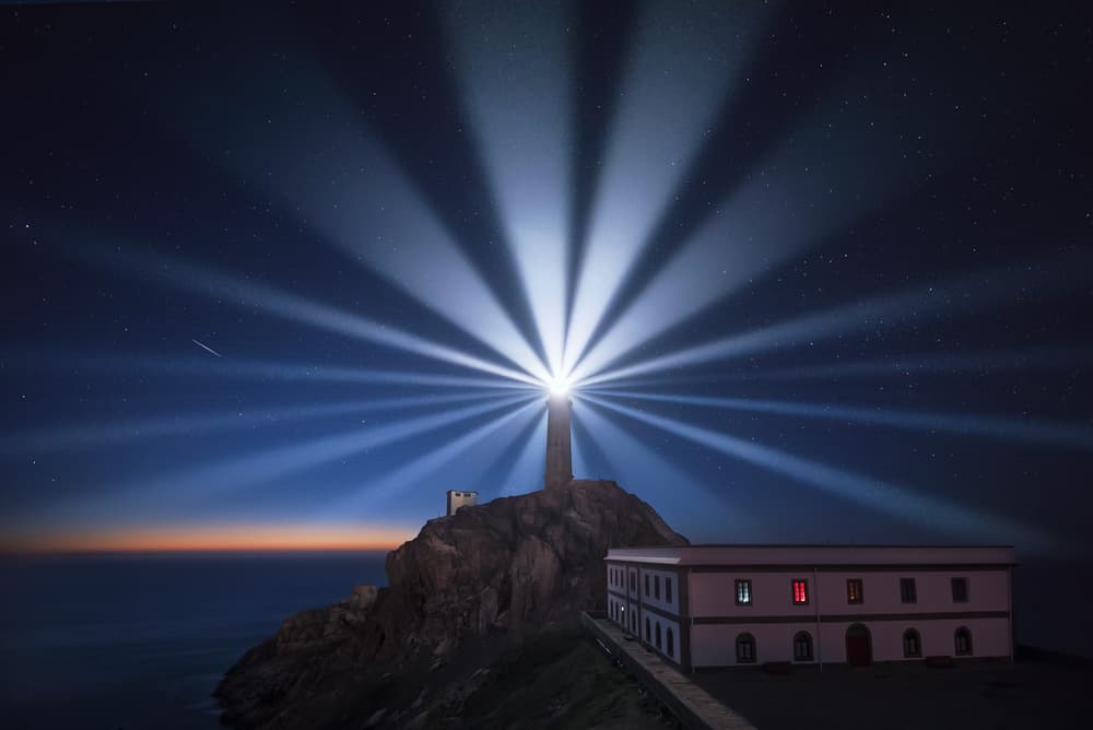 Starry Night Lighthouse by Carlos F. Turienzo — canvas wall art