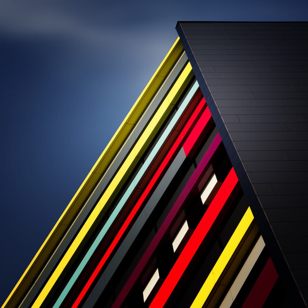 Vibrant Geometric Building by Jeroen van de Wiel — canvas wall art