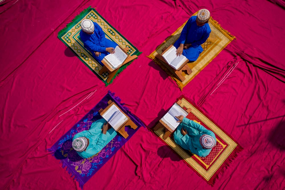 Muslim Men Studying by Azim Khan Ronnie — canvas wall art