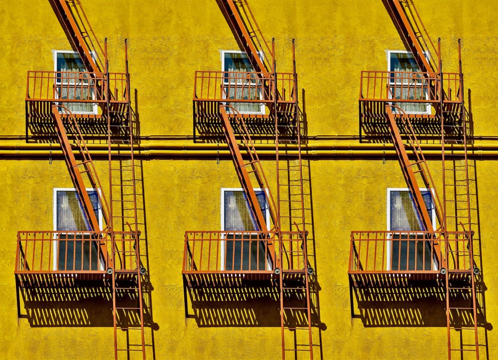 Bright Yellow Fire Escapes by Arnon Orbach — canvas wall art