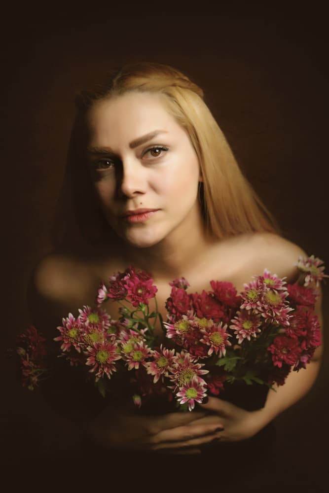 Pensive Woman with Flowers by Moein Hasheminasab — canvas wall art