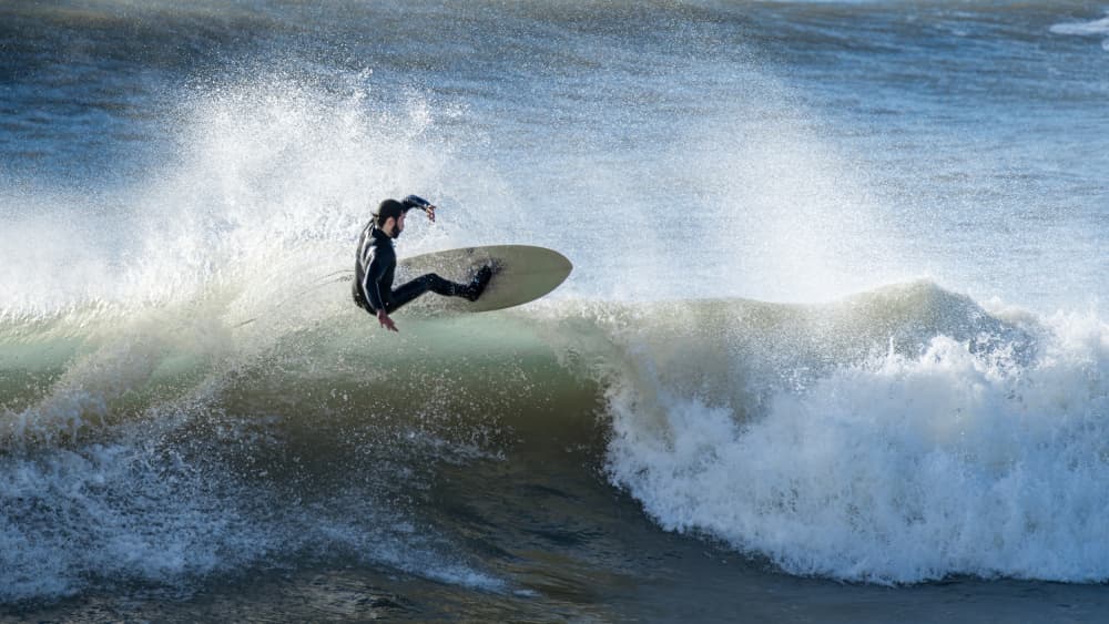 Surfer Rides Big Wave by Christiane Heggemann — canvas wall art