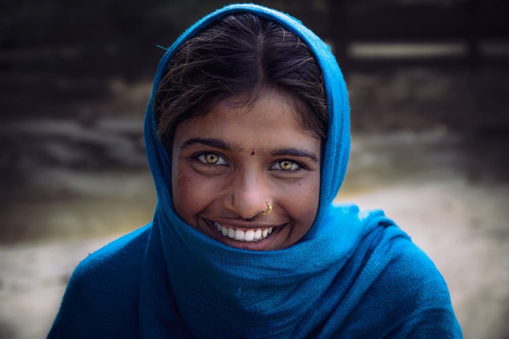 Smiling Woman Bright Eyes by Marco Tagliarino — canvas wall art