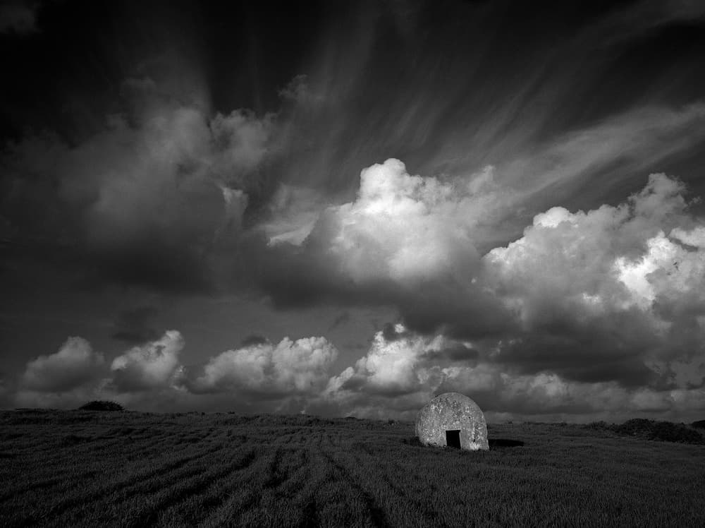 Solitary Hut Moody Sky by Nana Sousa Dias — canvas wall art
