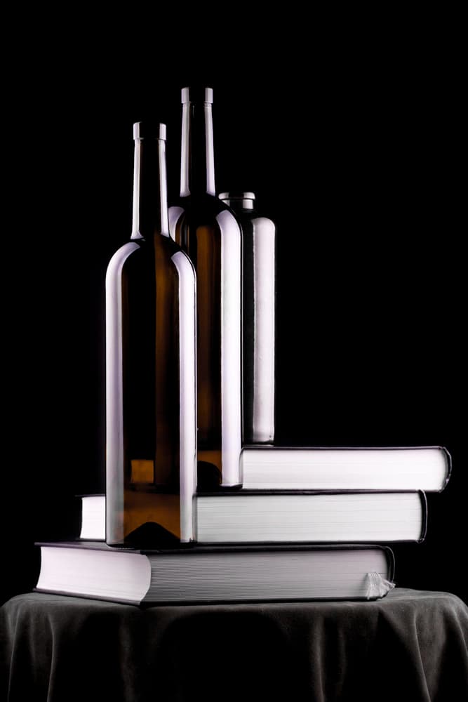 Elegant Bottles and Books by Brig Barkow — canvas wall art