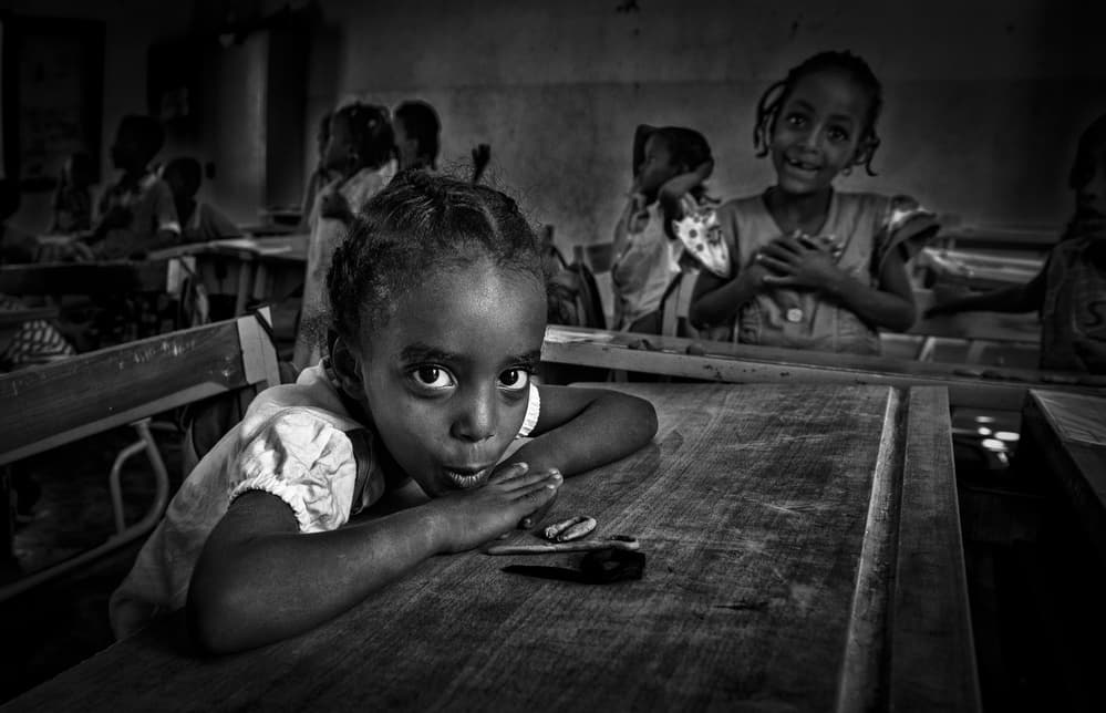 Curious School Girl by Joxe Inazio Kuesta Garmendia — canvas wall art