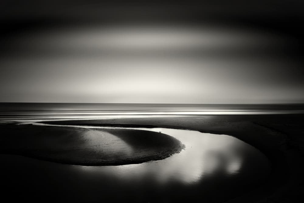 Serene Beach Reflection by Walter Caterina — canvas wall art