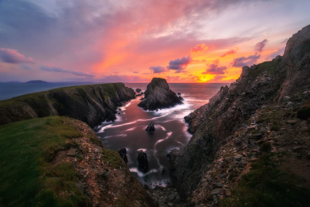 Vibrant Coastal Sunset by Junbo Liang — canvas wall art